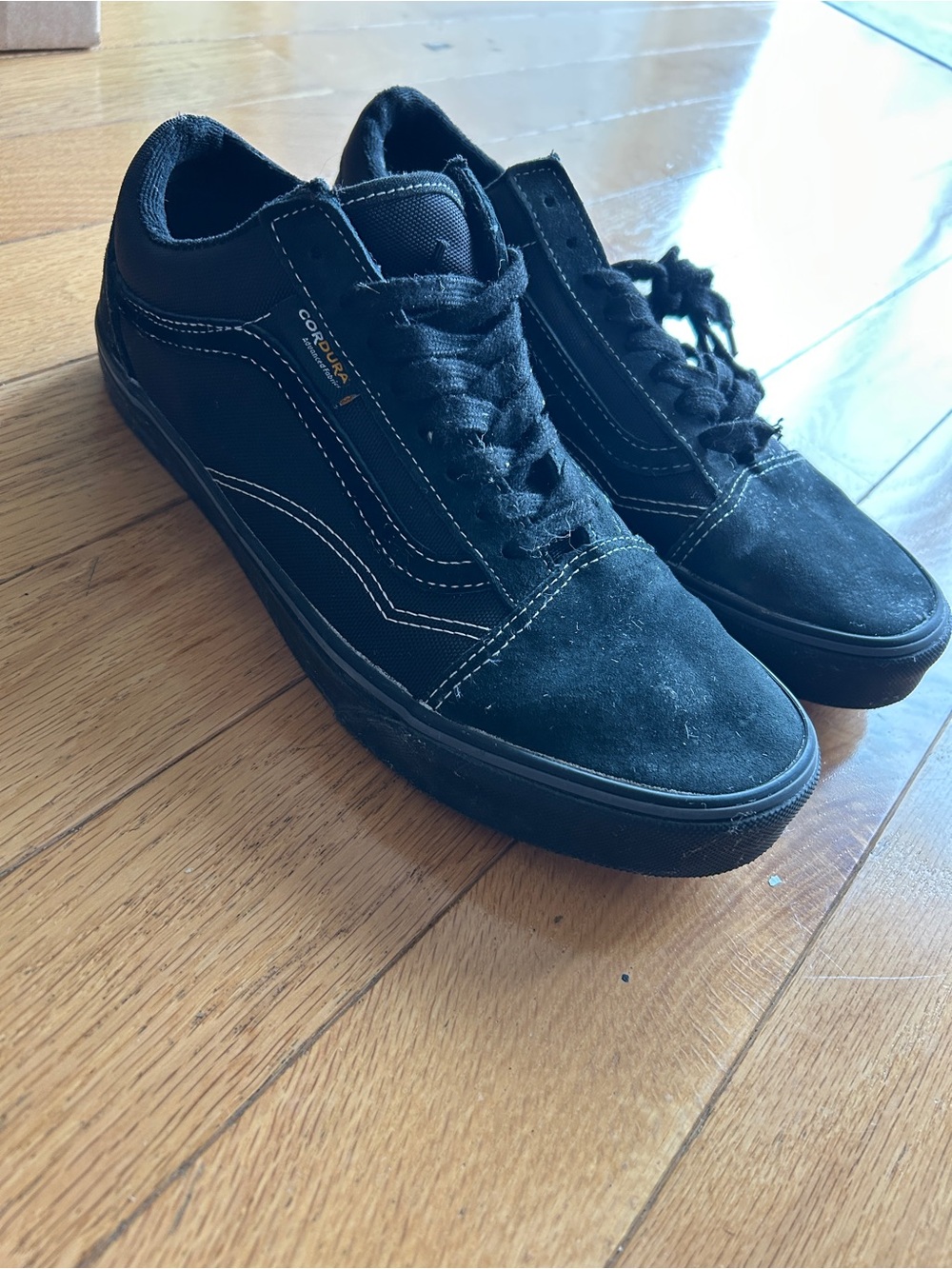 Vans Old Skool black-on-black sneakers. Men’s size 9 / Women’s size 10.5